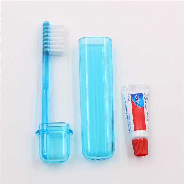 Brosse à dents pliante avec dentifrice