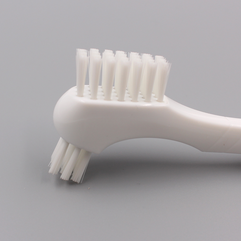 Brosse à dents de dentiture, version courte